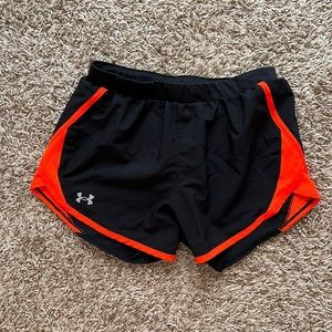 Black and red Underarmour running shorts